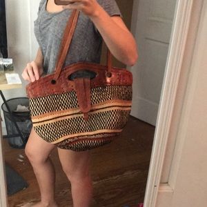 Vintage woven tote with hand tooled leather